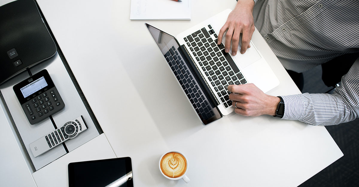 S Corporation, Is the S-Corporation the Right Entity Choice for Your Business?, image of a man working on a laptop